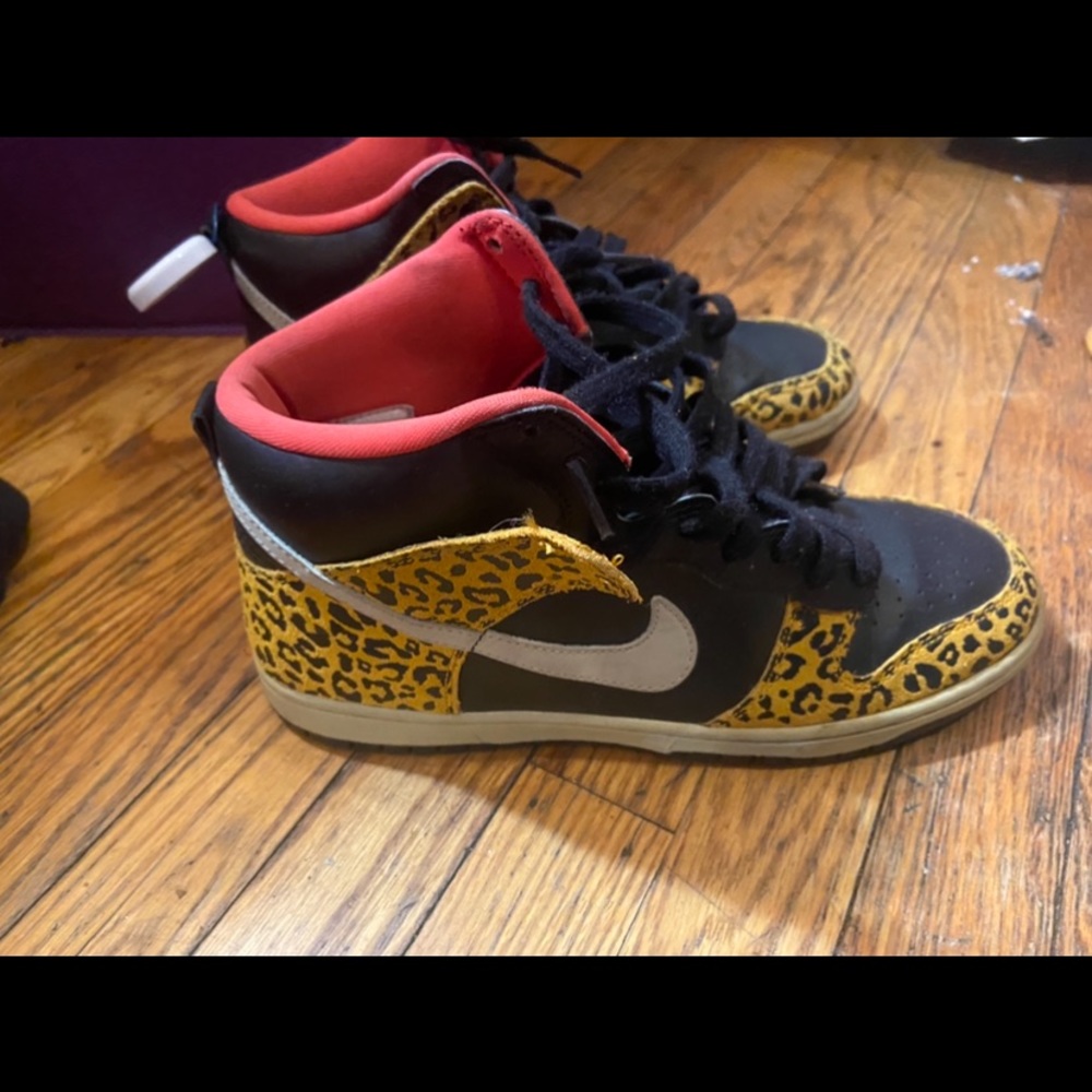 Nike high top leopard printed with red size 7 sneakers..
